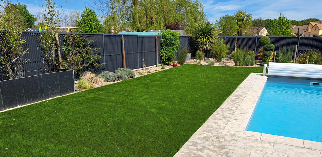 Artificial turf garden around a swimming pool