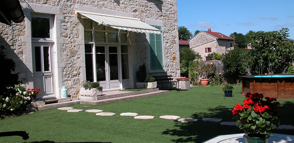 Artificial grass in front of a house