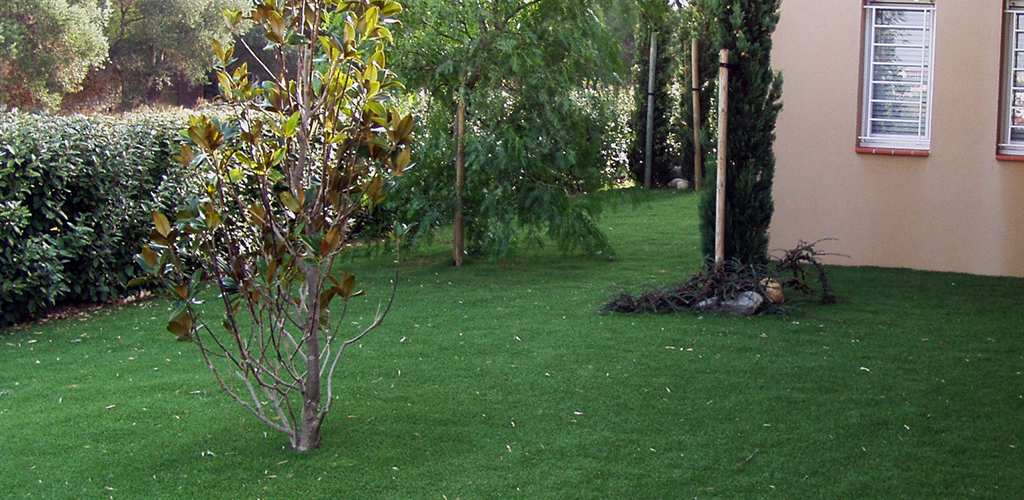 Artificial grass in front of a house