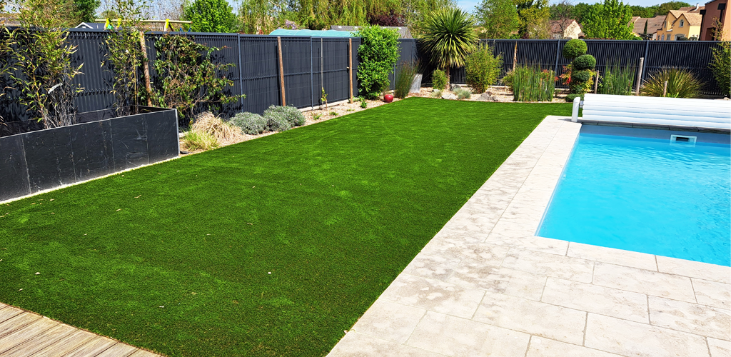 Artificial grass around a swimming pool